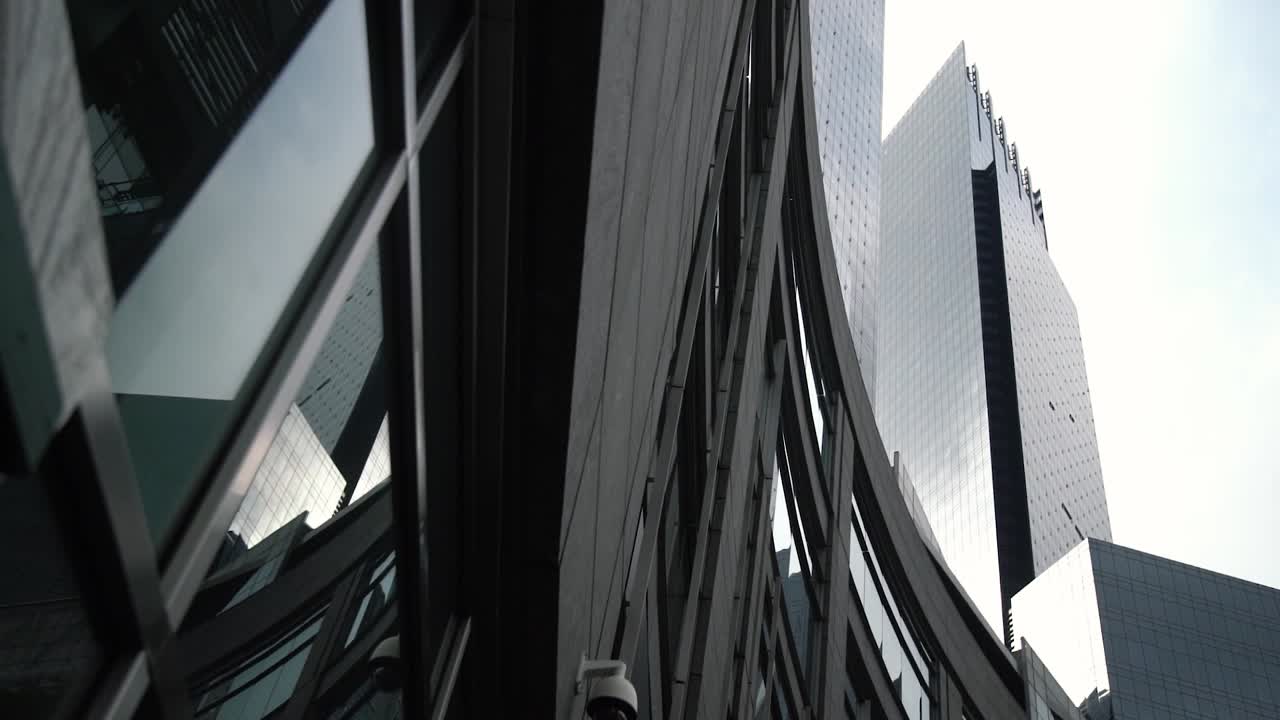 Dark Buildings in New York City, Dynamic Angle with a Smooth Motion.