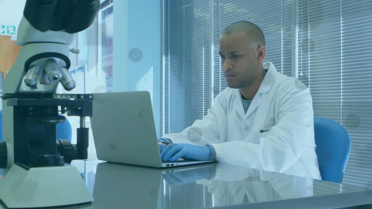 Researcher typing laptop glancing microscope, causing overlay to peak then thin while analyzing