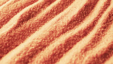 video de primer plano de arena de color naranja con patrón y fondo de espacio de copia