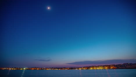 timelapse of marsaxlokk, malta as nightfall sets in