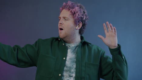 man singing and dancing