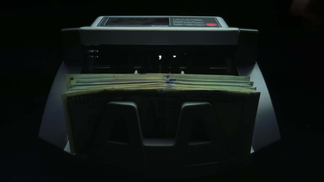 Automatic equipment for counting paper currency. Counter counting dollar bills