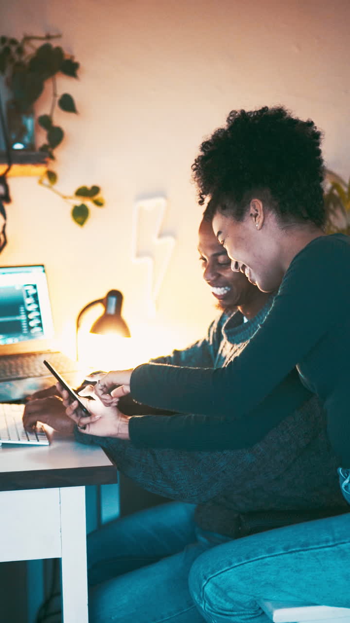 Happy Young Couple Sharing a Moment While Working from Home