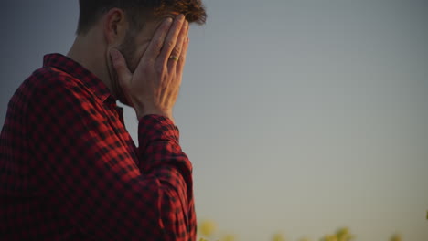 close-up of sad farmer facing losses
