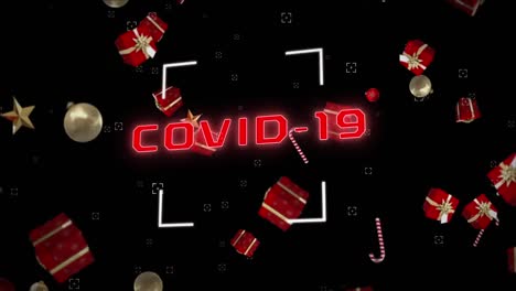 Animation-of-covid-19-text-with-candy-canes-and-christmas-decorations-falling-on-black-background