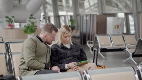 couple waiting at airport