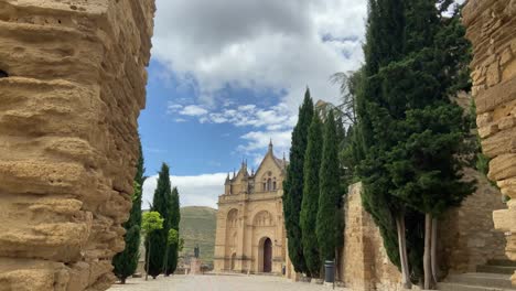 Touring-the-monumental-city-of-Antequera-in-Malaga,-for-its-citadel-and-its-majestic-royal-collegiate-church-of-Santa-Maria,-a-Renaissance-and-Baroque-church-with-cobbled-streets