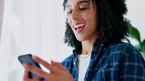 Woman,-smartphone-and-laughing-in-home-for-social