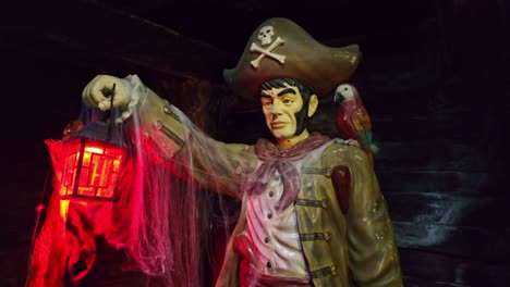exhibited pirate statue at a museum with lantern in his hand, saint-malo, france.