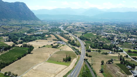 aerial view of highway through valley landscape