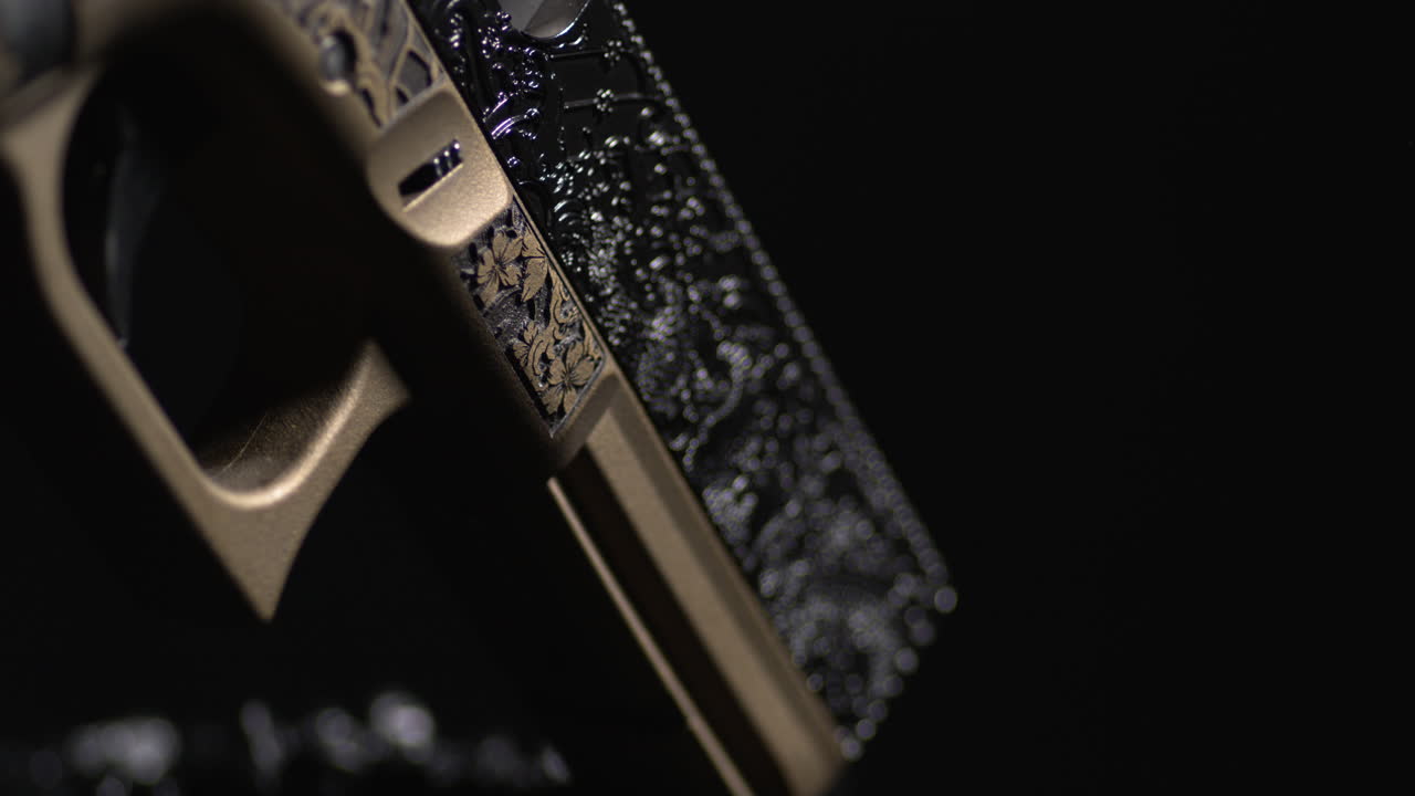 Closeup Of Laser Engraved Single-action Pistol. Custom Firearms. studio shot
