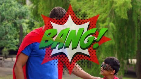 bang text on speech bubble against dad and son in superhero costume