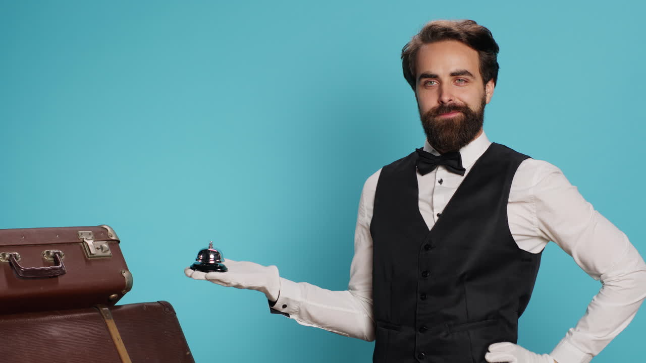 Hotel concierge presents service bell