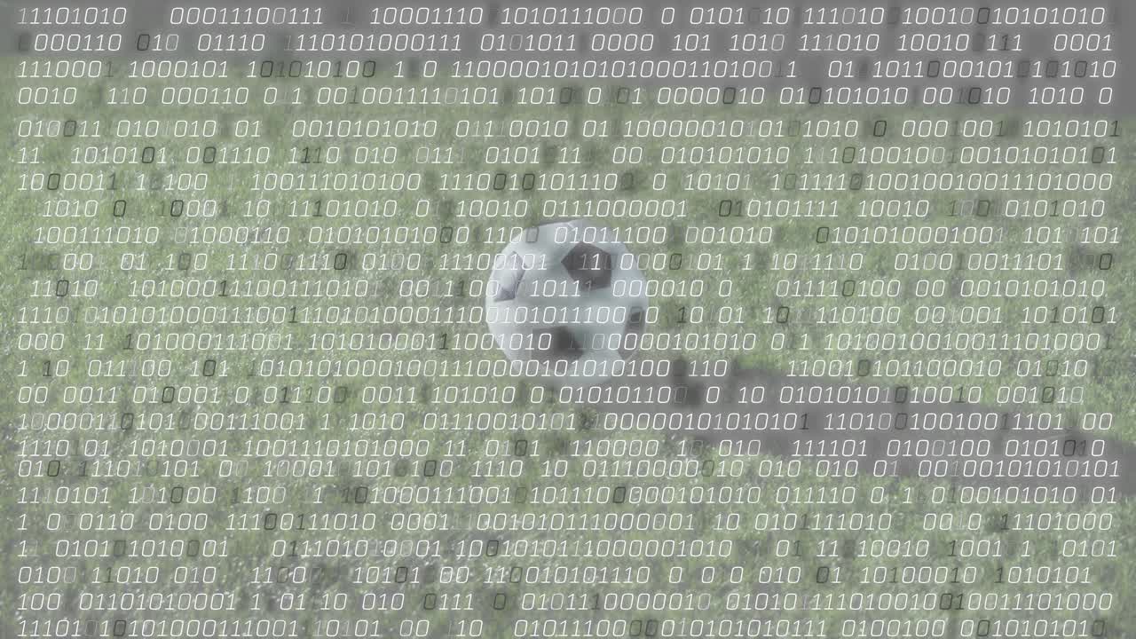 Binary code intensifying while soccer player approaching ball and kicking for sports analytics