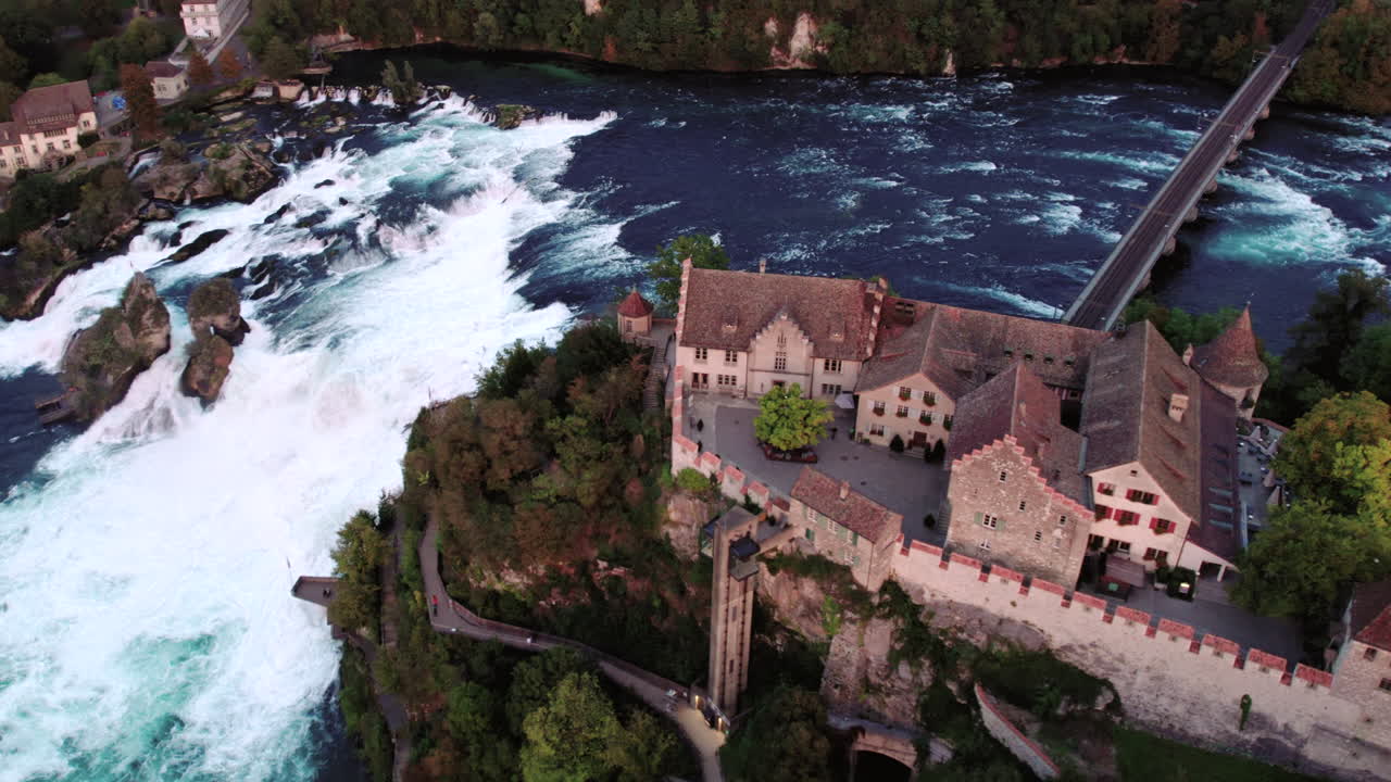 Aerial of Rhine Falls with castle in foreground, Schaffhausen, Switzerland