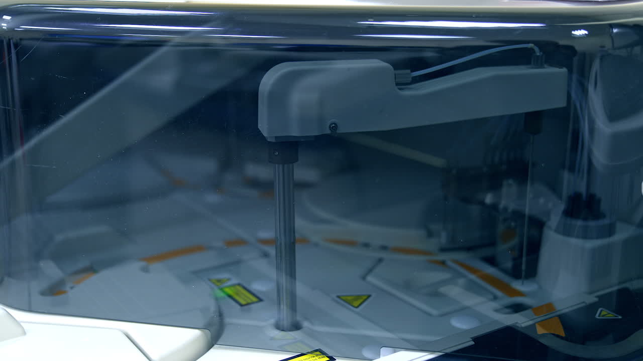 Moving details inside the technological machine. Advanced equipment in modern laboratory for medical tests. Close up.