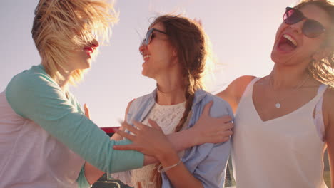 Female-Friends-On-Road-Trip-In-Convertible-Car-Shot-On-R3D