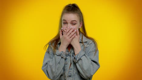 frightened scared girl closing her mouth gestures no, refusing to tell terrible secret, truth