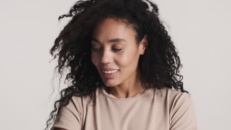 African-american-cute-woman-over-white-background.