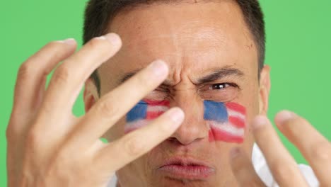 man with usa national flag upset with a referee