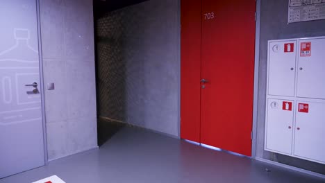 red door in a modern corridor