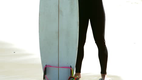 man in wet suit relaxing