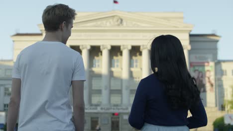 couple looking at a building