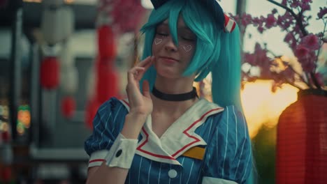 teenager in hatsune miku cosplay
