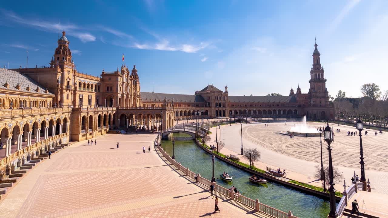 Plaza de España in Sevilla time-lapse tilting up on a sunny day with people enjoying Andalusian culture, 4k timelapse