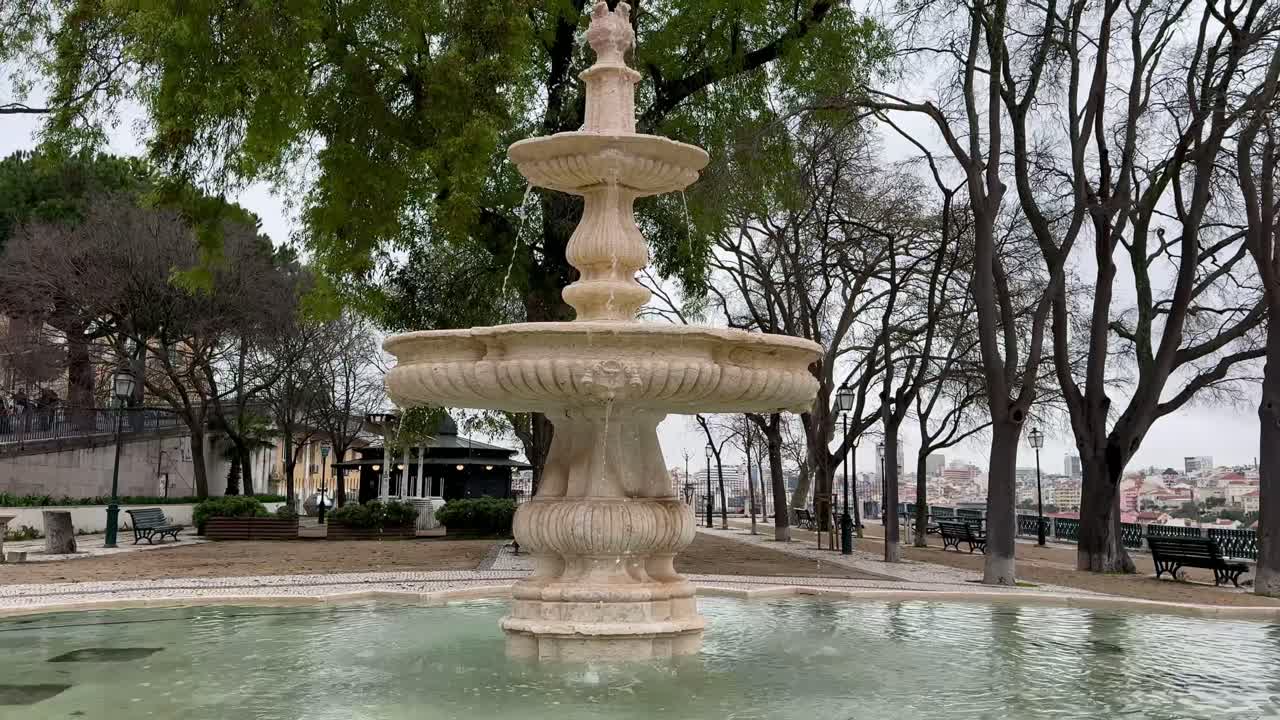 Ornate stone fountain in Lisbon’s Jardim de São Pedro de Alcântara.