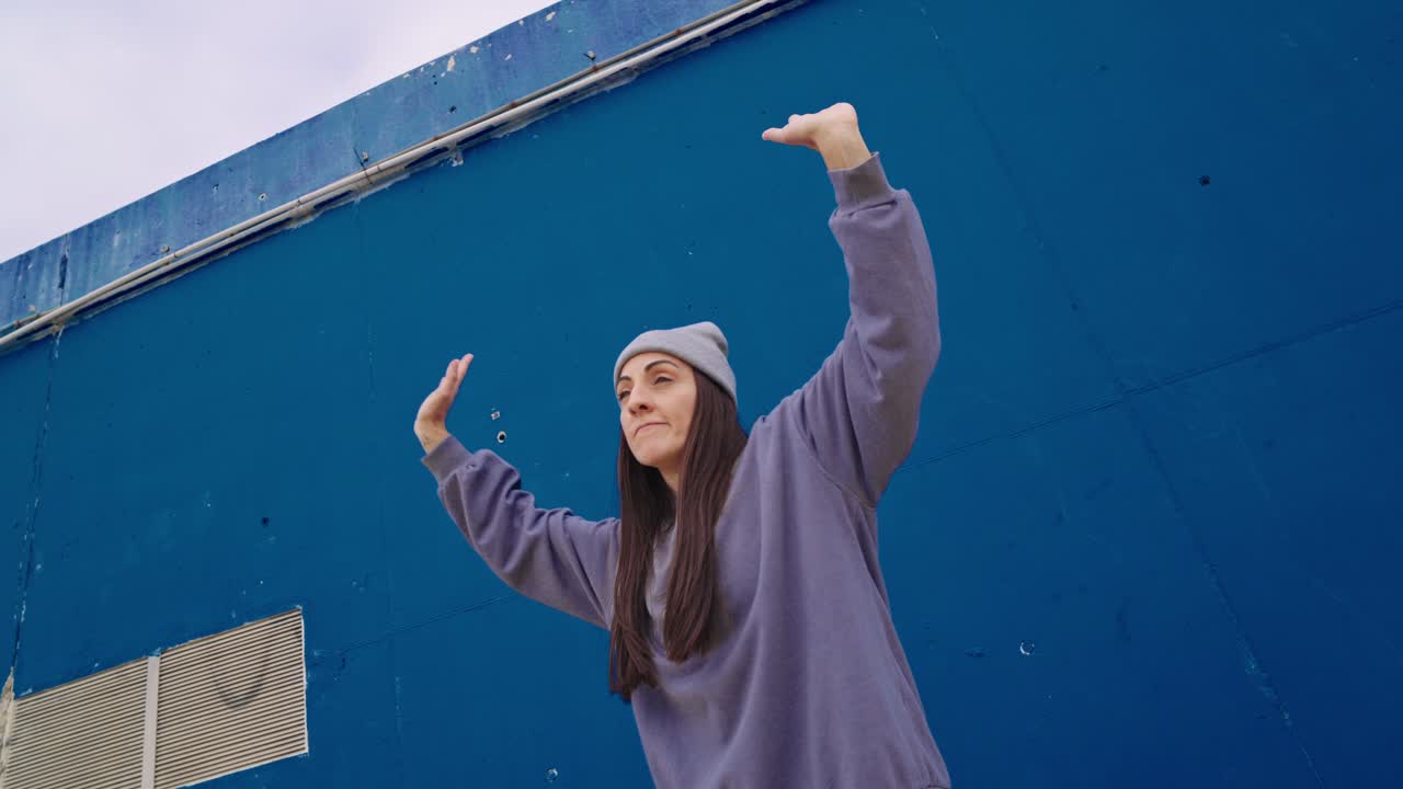 Woman Dancing in Urban Environment