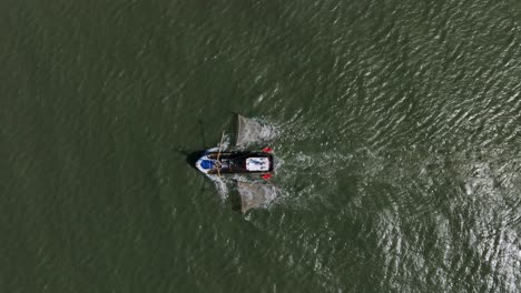 Large-Fishing-Trawler,-Trawling-Fishing-Nets,-Aerial-Top-Down-Slow-Motion-Shot