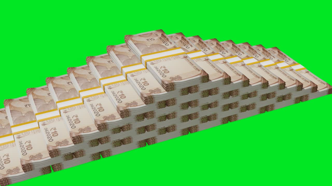 Many wads of money  on chromakey background. 10 Indian Rupees banknotes. Stacks of money.