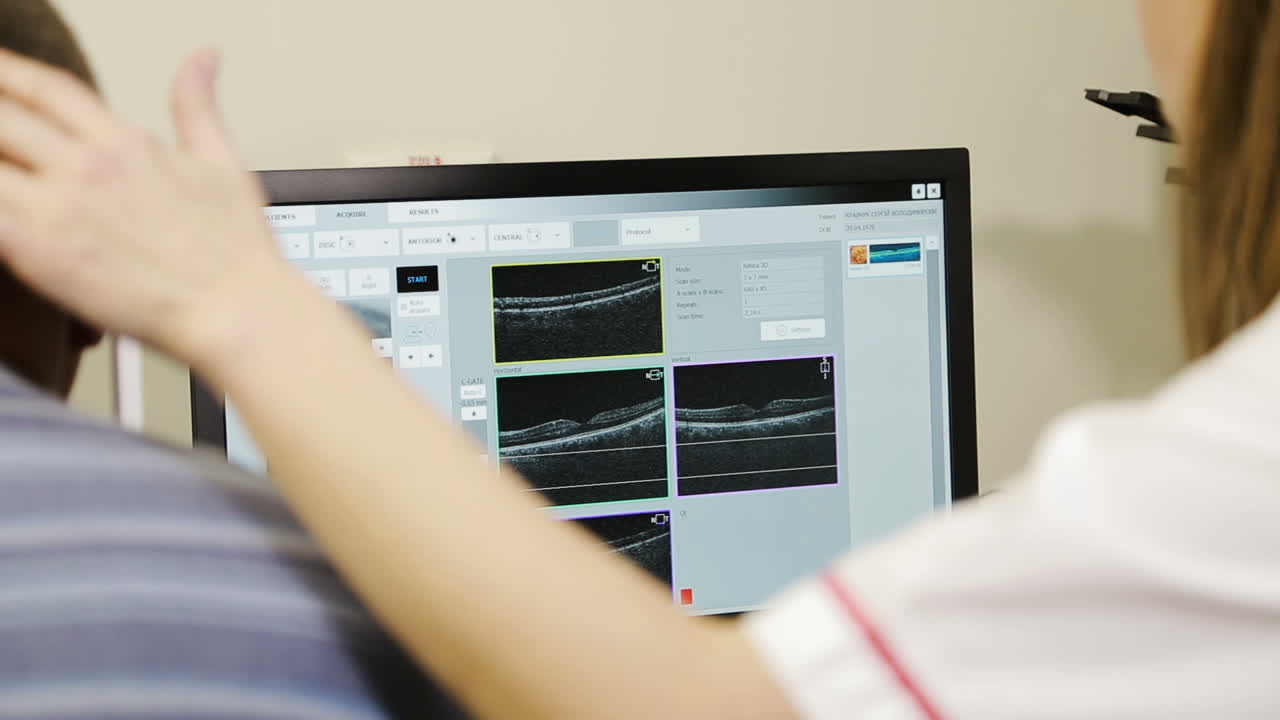Man taking eye test examination. Ophthalmologist doing eye test on man patient in clinic