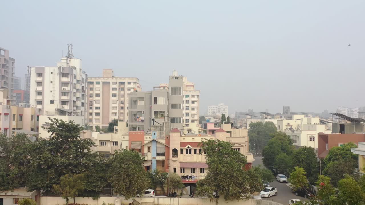 establishing shot of city view when commercial and residential building pop up