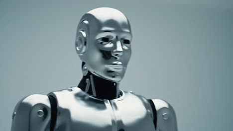 a glimpse into the future: exploring the sophisticated design and structure of a chrome-plated humanoid robot captured in two distinct frames