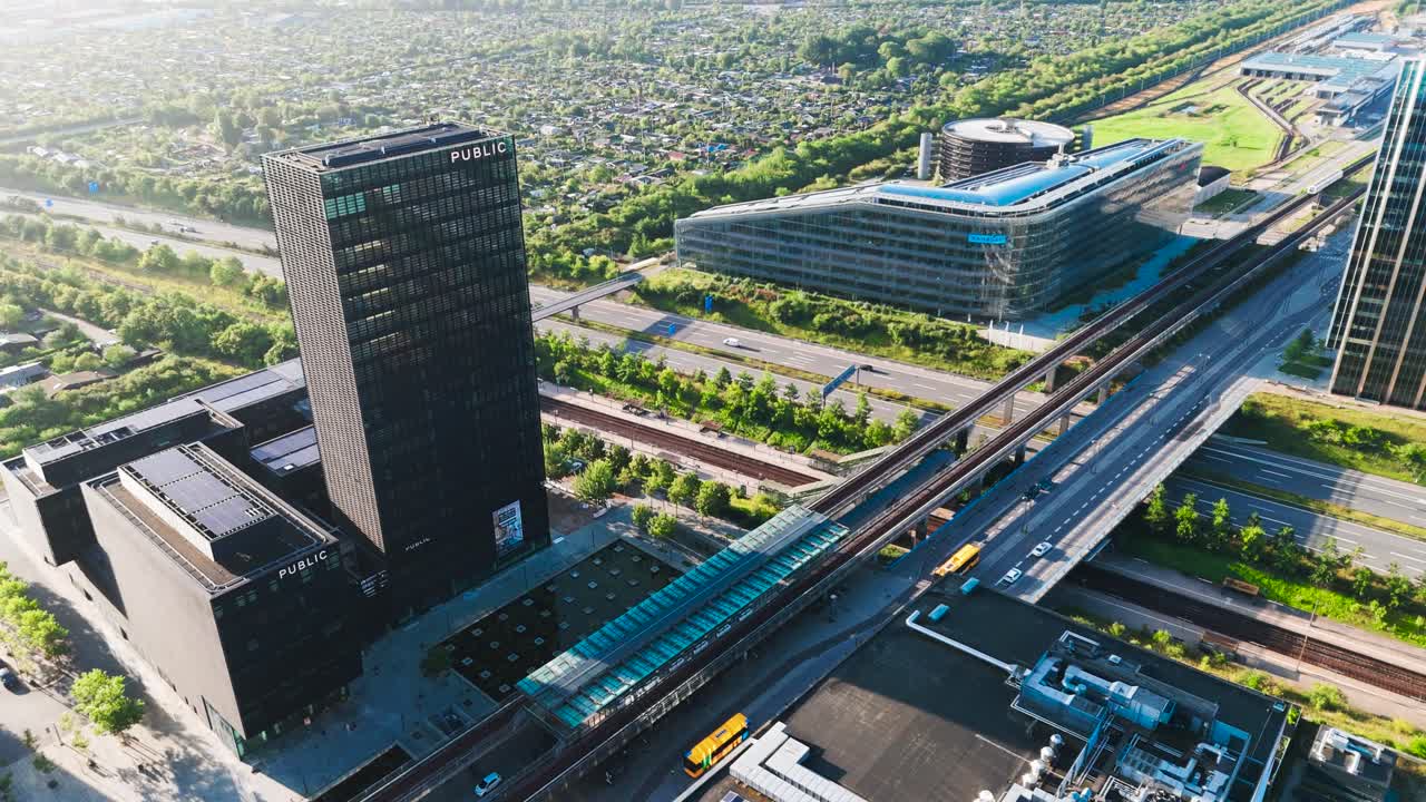 Aerial - multistory office building near Orestad metro line station, Copenhagen