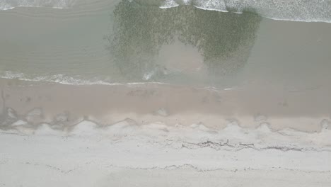 Drone-Ascending-On-The-Calm-Sandy-Shore-Of-Keel-Beach-On-Achill-Island,-County-Mayo,-Ireland