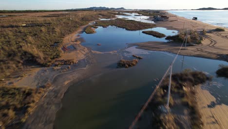 Tidal-lagoon-with-shallow-water-ponds-surrounded-by-marshes,-ideal-place-for-breeding-fish-and-birds