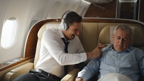 businessmen on an airplane
