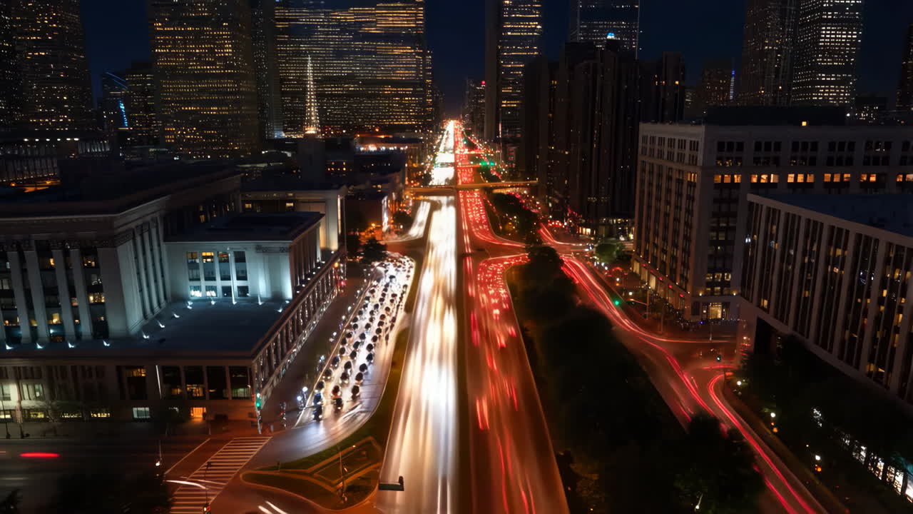 Night Cityscape with Traffic Light Trails and Illuminated Buildings
