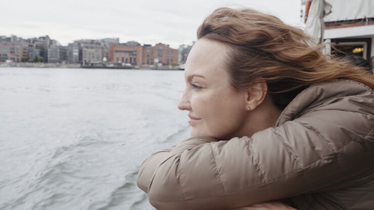 Woman enjoying a view from a boat