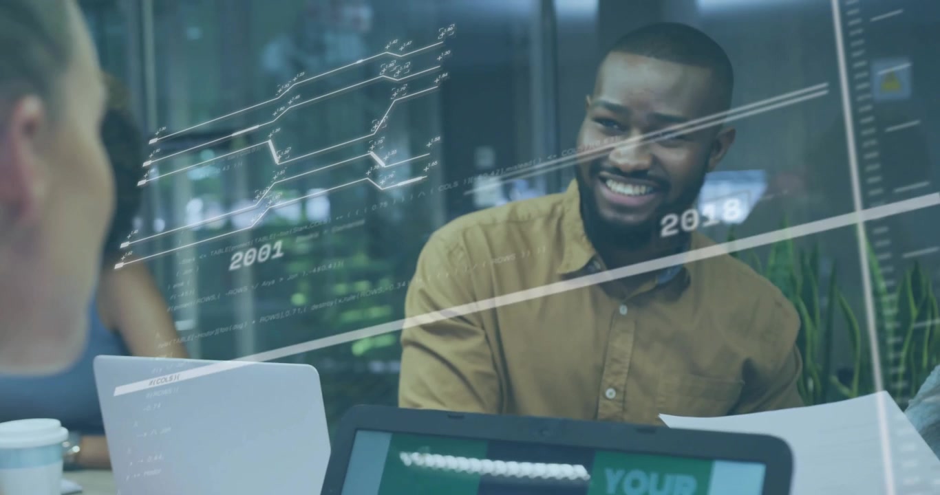 Diverse Business Team Collaborating in Modern Office with Digital Data Overlay