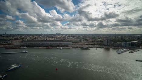 timelapse video of the view over the ij river, looking of the central station towards the south side of the city.
