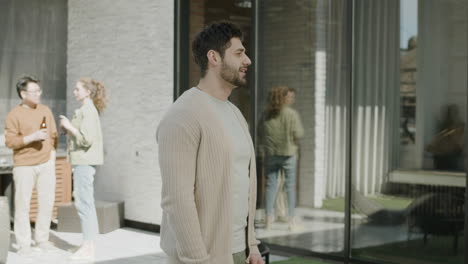 a young male gives a welcome home hug to an afroamerican beautiful female