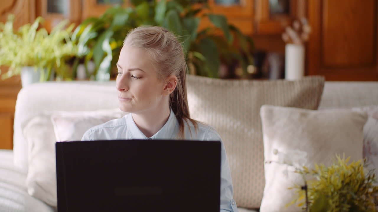 Beautiful Thoughtful Concerned Woman Working On Laptop