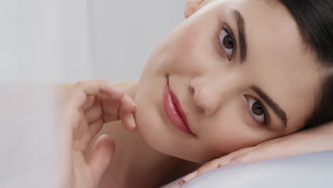 close-up-portrait-beautiful-caucasian-woman-touching-face-with-hand-caressing-smooth-healthy-skin-complexion-enjoying-perfect-natural-skincare-gorgeous-feminine-beauty-concept