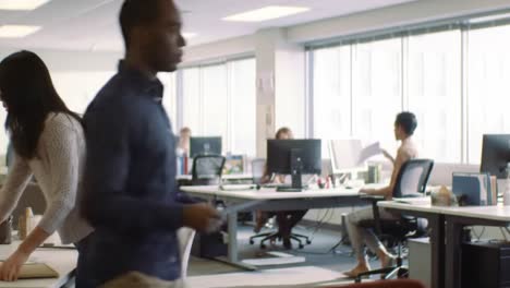 a dynamic office environment: capturing moments of collaboration and activity among colleagues in a modern workspace