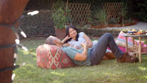 mature couple relax in garden together shot in slow motion