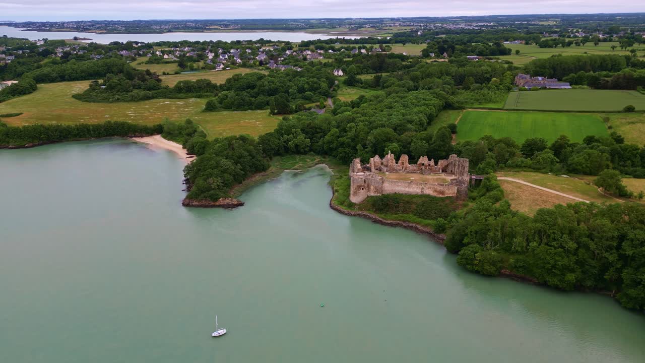 Distant drone view of the medieval Guildo Castle at Arguenon, Saint-Jacut-de-la-Mer, Côtes-d'Armor, Brittany, France.